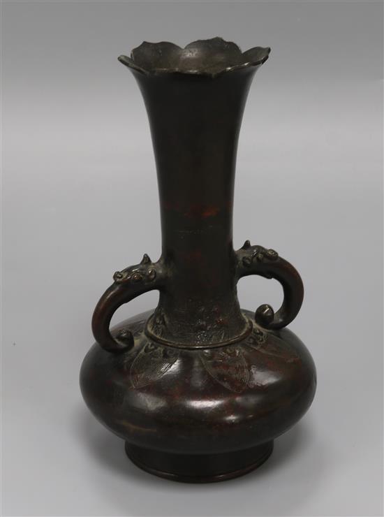 A Chinese bronze bottle vase, Song - Yuan dynasty, height 23cm, old repairs